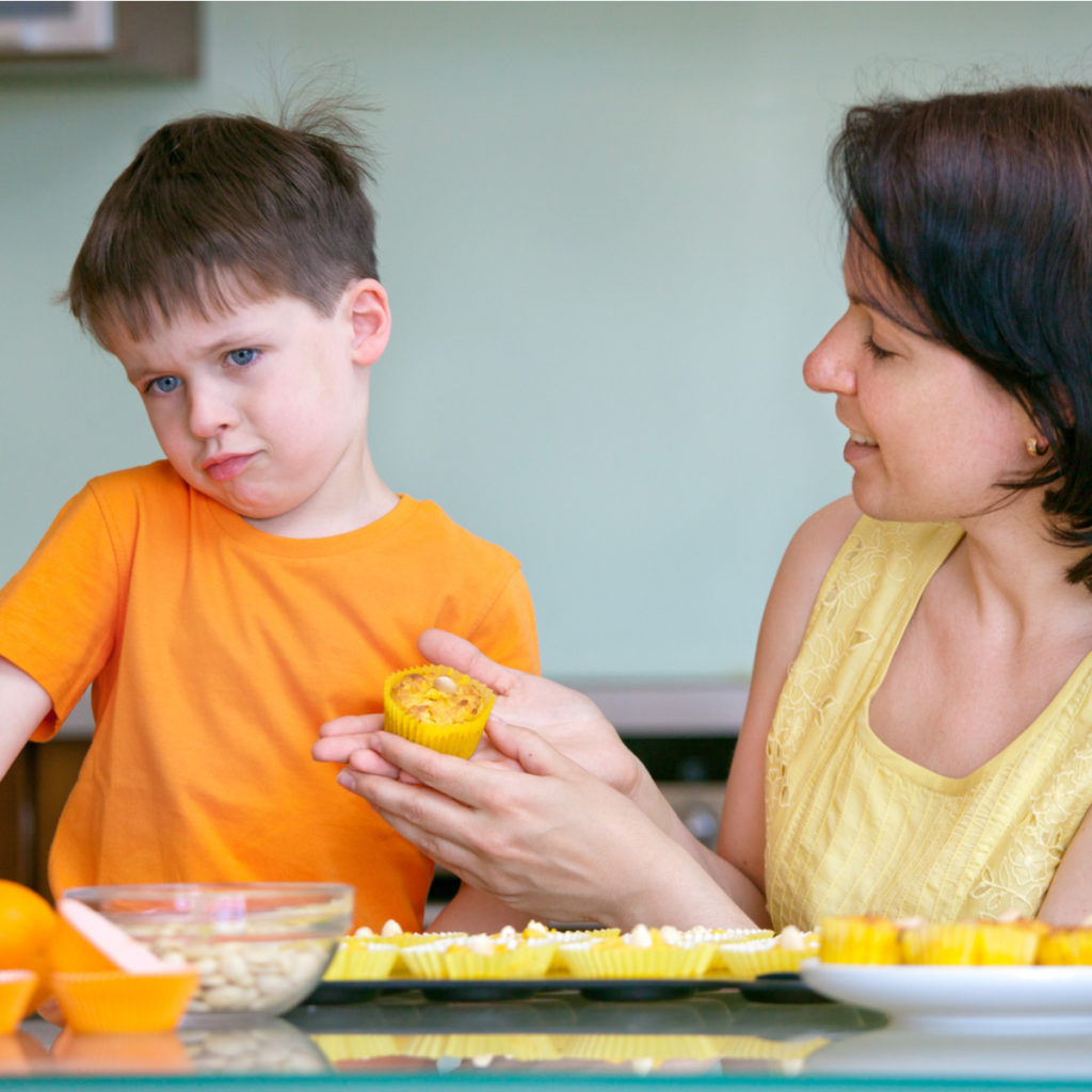 Mum tries to convince picky eater to try food